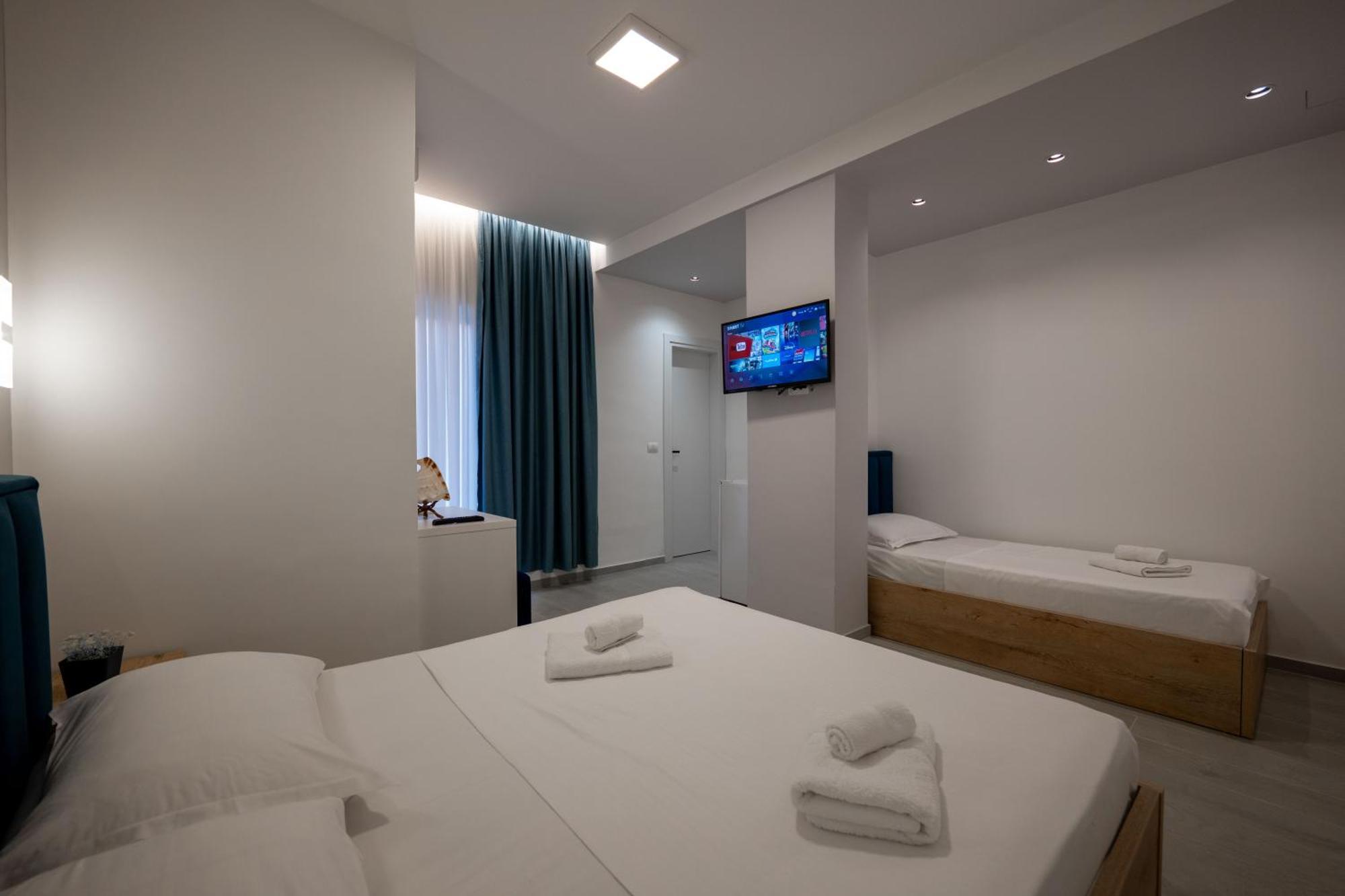 Twins Hotel Ксамил Экстерьер фото