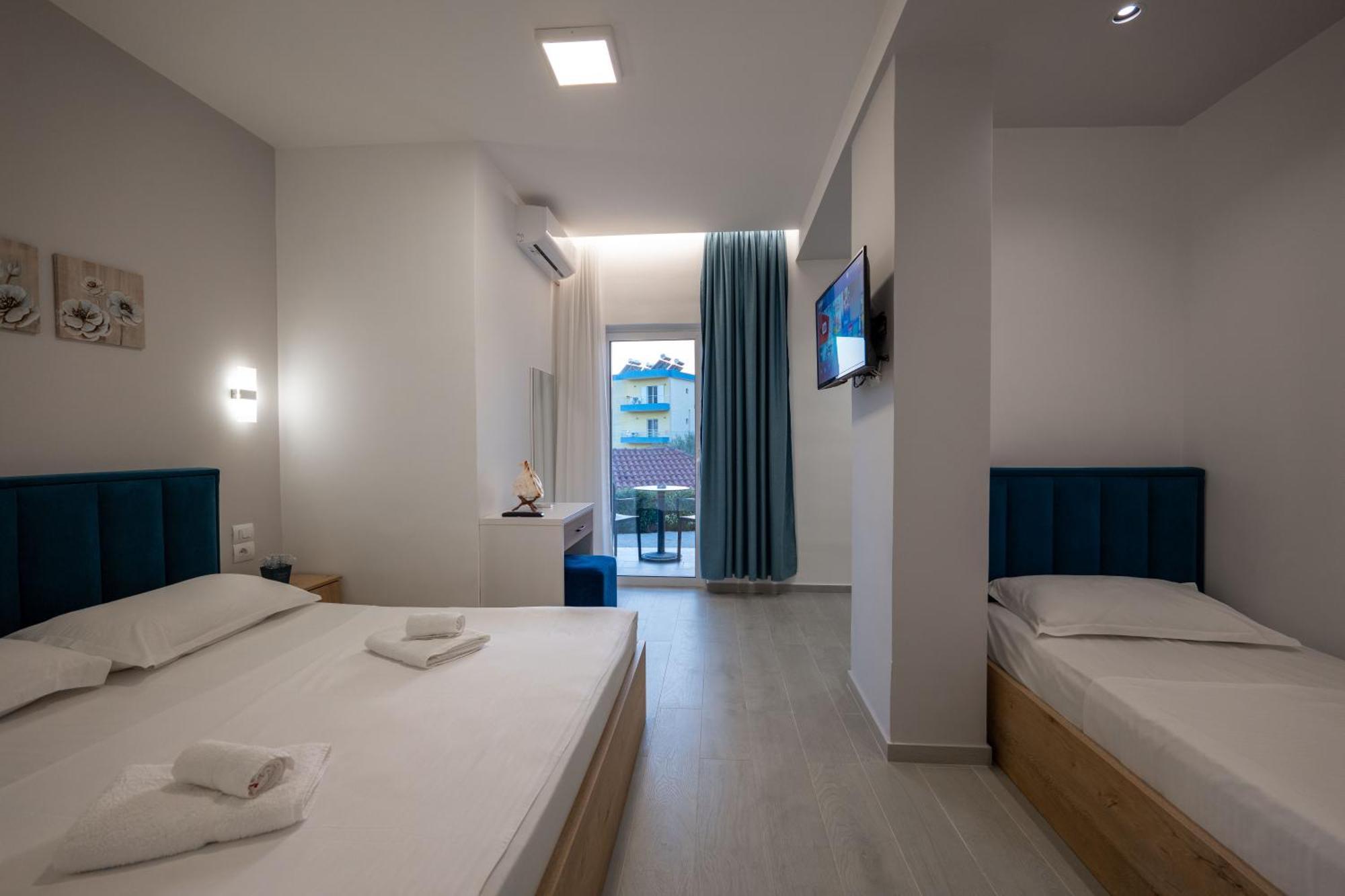 Twins Hotel Ксамил Экстерьер фото